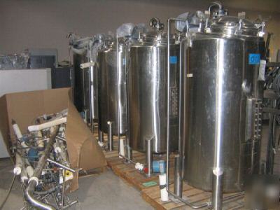 Used 150 gallon stainless steel vertical tank. by dci
