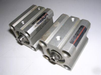 (2) used smc air cylinders, 20MM by 25MM, CQ2B20-25D