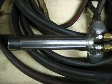 Oxy-acetylene regulators with aprox. 25 feet of hose