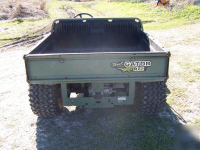 Used 4X2 john deere trail gator with bed liner