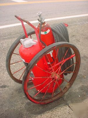 Vintage industrial wheeled ansul fire extinguisher