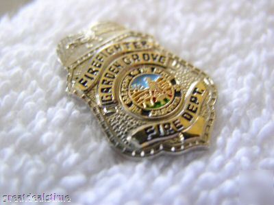 Garden grove,ca~fire dept.mini eagle fireman badge,bage
