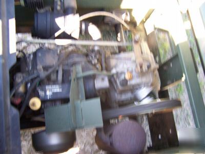 Used 4X2 john deere trail gator with bed liner