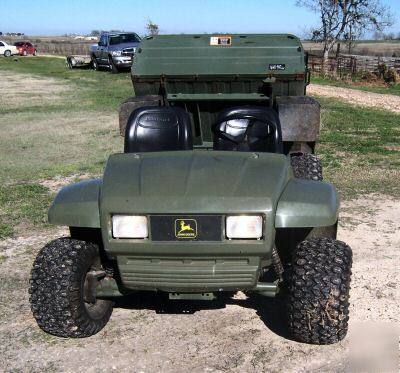 Used 4X2 john deere trail gator with bed liner