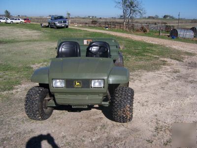 Used 4X2 john deere trail gator with bed liner