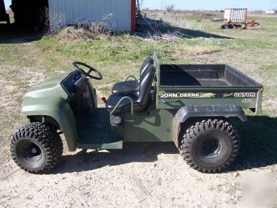 Used 4X2 john deere trail gator with bed liner