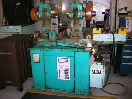 Barker model amd twin head duplex production mill 