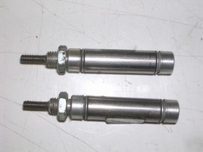 2 used clippard single actting air cylinder 5/16 x 1/2